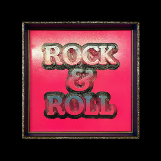 Multiple layered laser cuts finished in hot pink and glitter with a glossy varnish. Built in to a hand made box frame in complimentary colours. pop art cooper font rock and roll maximalist artwork wallart