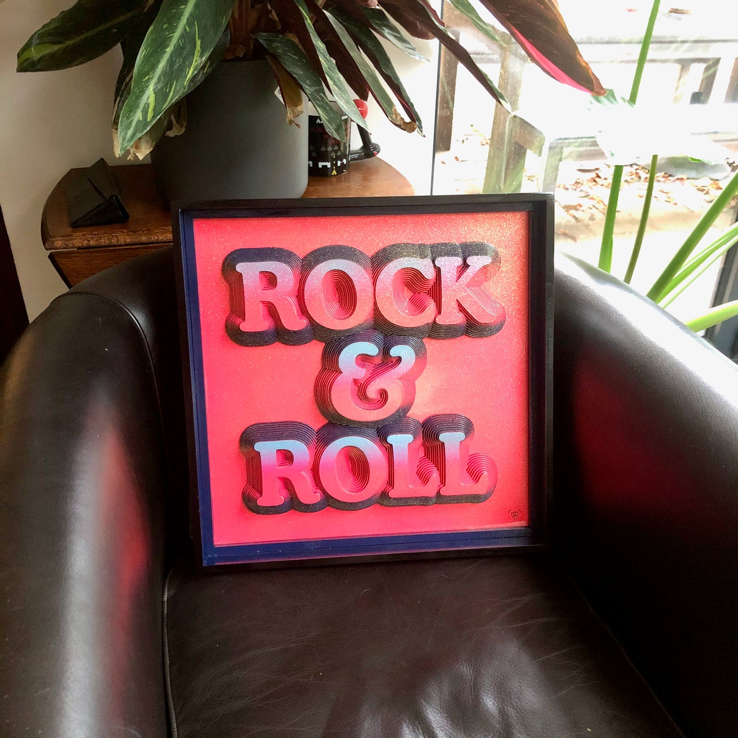Multiple layered laser cuts finished in hot pink and glitter with a glossy varnish. Built in to a hand made box frame in complimentary colours. pop art cooper font rock and roll maximalist artwork wallart