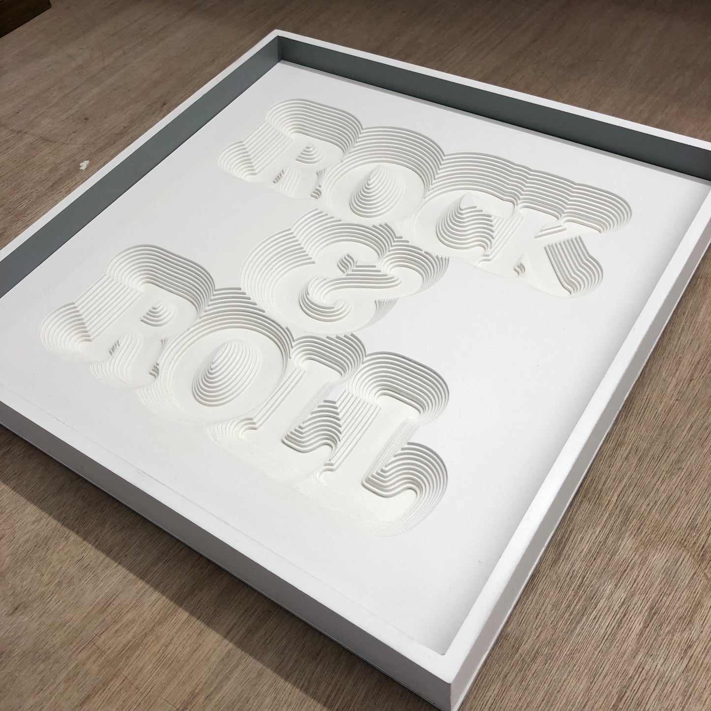 Rock_and_Roll_with_black_background wall art layers bone white poop art ampersand and cooper font artwork minimalist monotone abstract